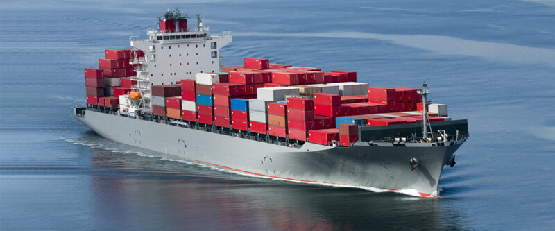 Marine ship with red containers